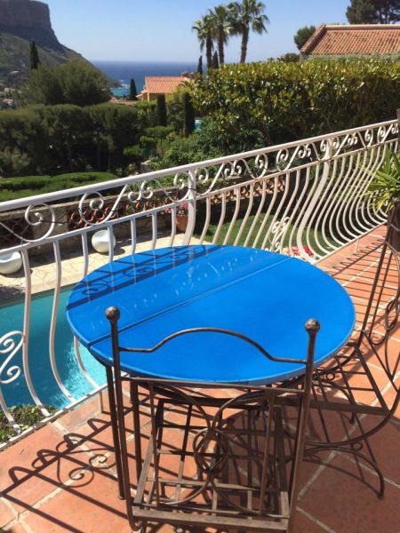 Table console demie lune en pierre de lave émaillée